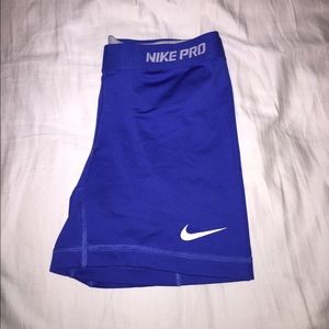 Black and blue Nike pros