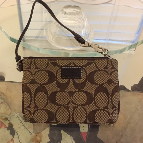 Small brown coach wristlet