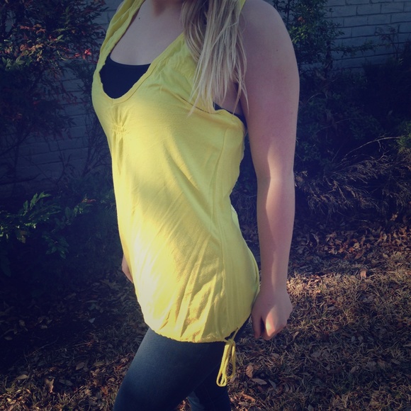 Yellow tank with cut out lace back.
