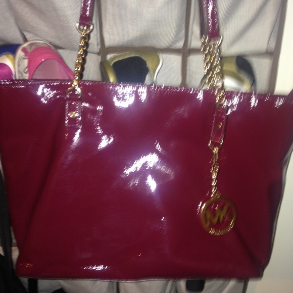 Burgundy Michael kors hand bag