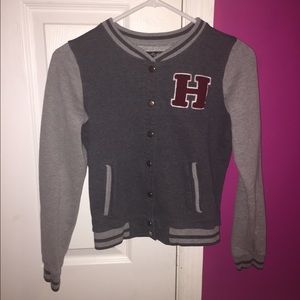 - Letterman jacket , with an " H " on it .