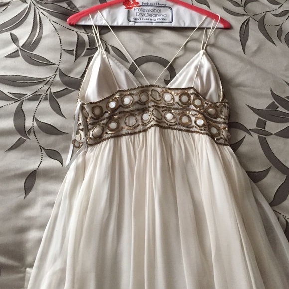 Long white prom dress (pictured left) model is 5'8 - Picture 3 of 4