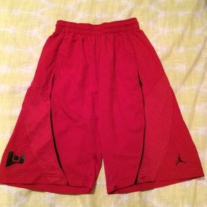 Red Nike men's basketball shorts