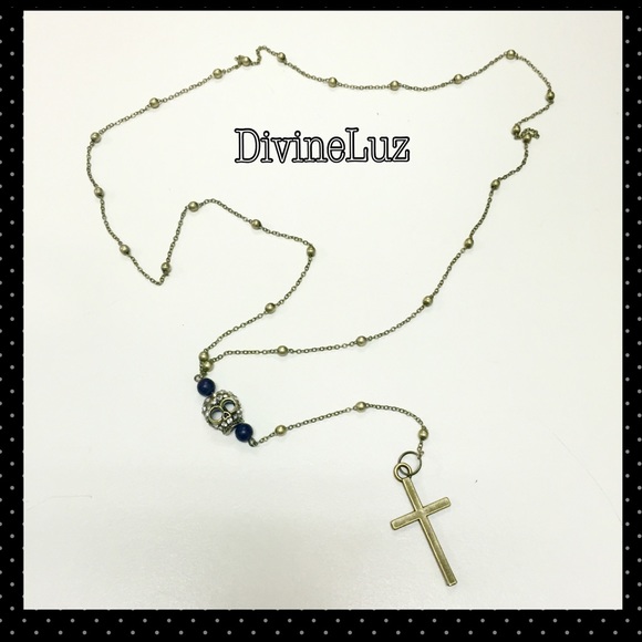 Rosary style bronze necklace with skull and cross.