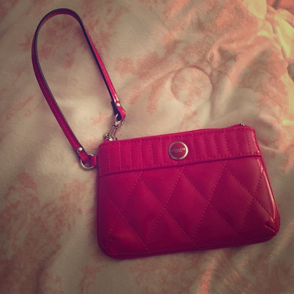 Red coach wristlet.