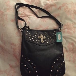 Black cross-body purse.