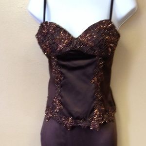 Two piece formal wear. (Top and skirt)