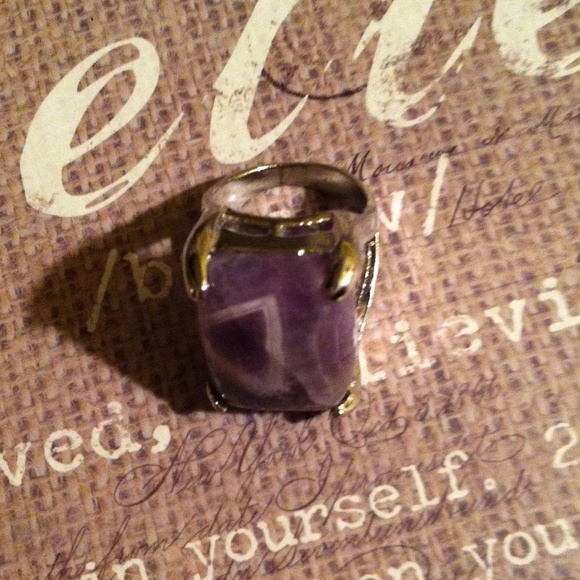 Silver ring with purple stone