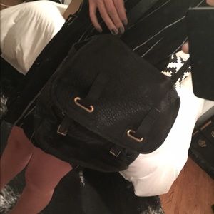 Yves Saint Laurent black leather purse