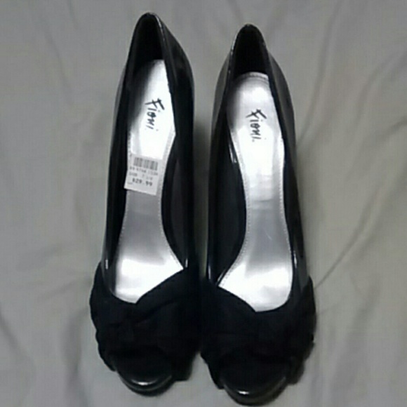 Deep purple peep toe platform pumps.