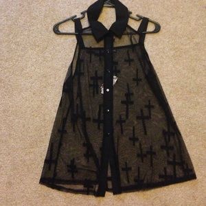 All black see through collard shirt.