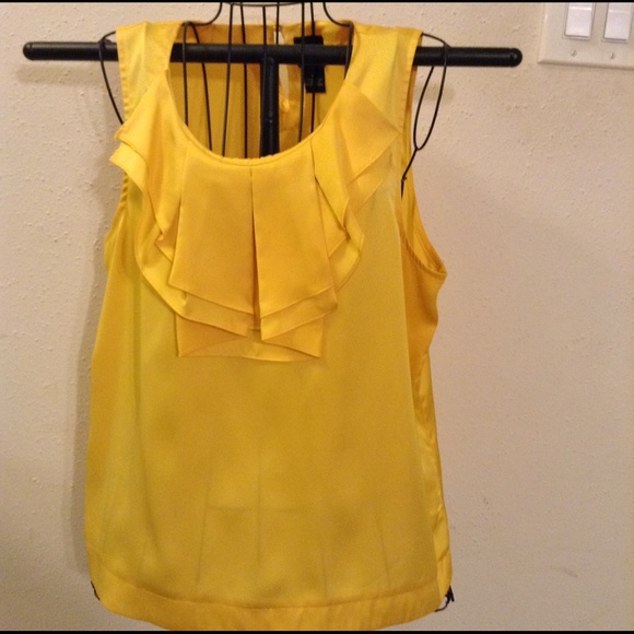 Bright yellow sleeveless blouse
