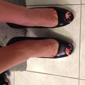 Black peep toe pumps