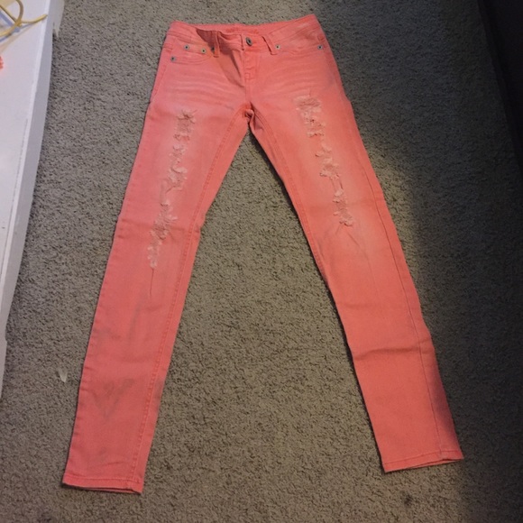 Coral ripped skinny jeans