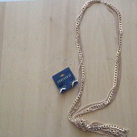 Gold colored jewelry bundle bow earrings & chain