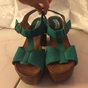 Comfy strappy platform looking short wedges.