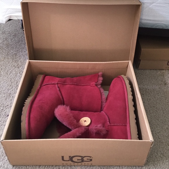 Two pairs of Uggs- red and green