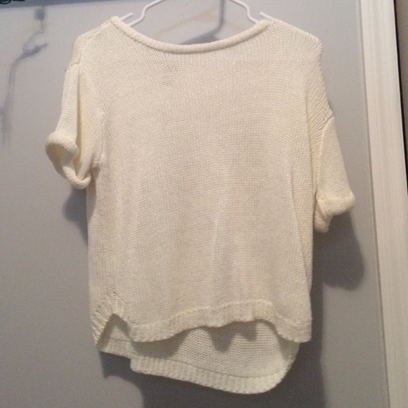 a sheer white crop top