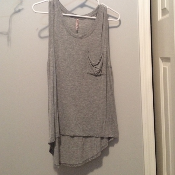 a grey long shirt meant to be worn for leggings