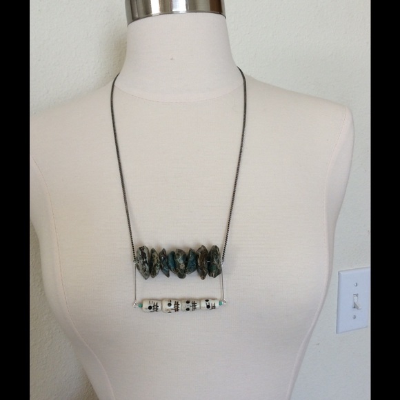 Long chain with precious stone and bone