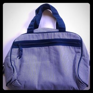 Blue striped Thirty-One make up bag