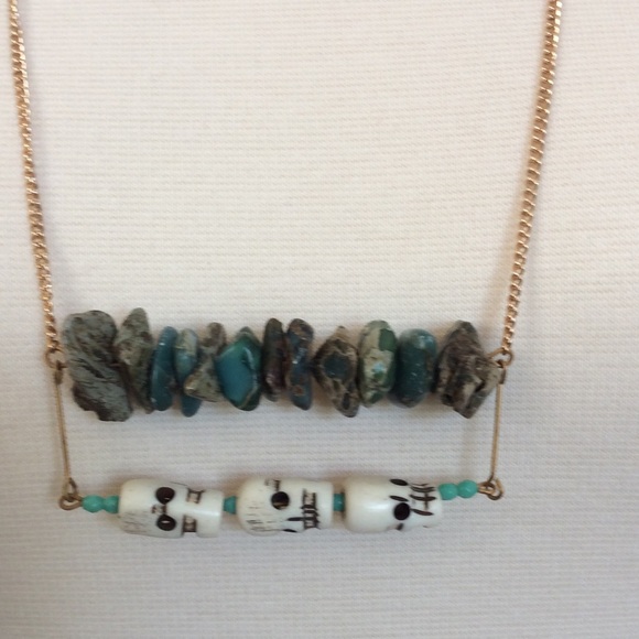 Long gold chain w/ precious stone & bone