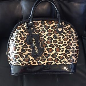 Hello kitty cheetah tote with matching wallet.