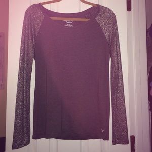 A. Eagle- Sparkle sleeved baseball shirt/blue tank