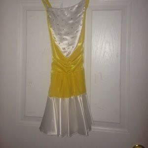 White and yellow dance costume