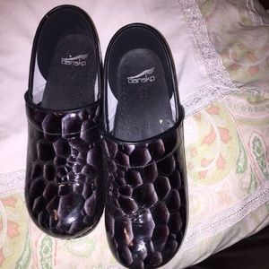 Dansko clogs in perfect condition.