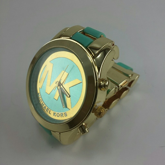 Teal and gold watch. No trades.