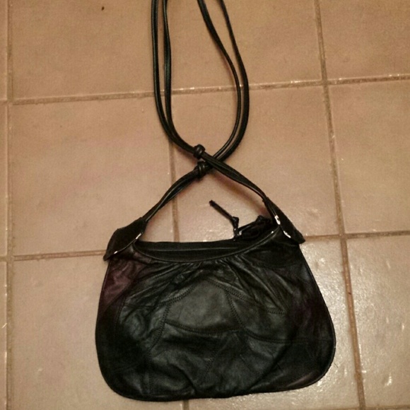 Small black with burgundy patches