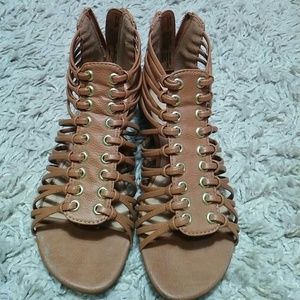 Gladiator sandals. Able to fit size 5.5/6