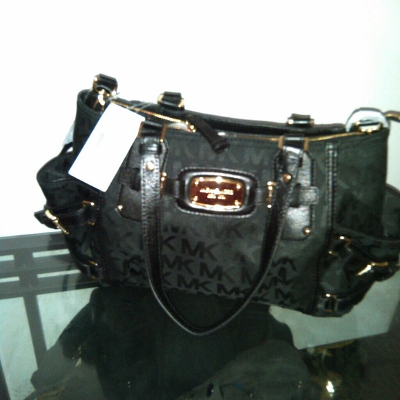 **Sold**Black Mk Gansevoort large Reg $300