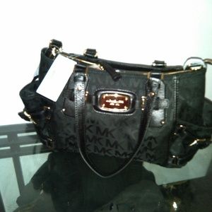**Sold**Black Mk Gansevoort large Reg $300