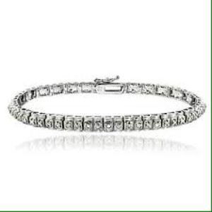 1/2 CT Silvertone diamond studded tennis bracelet