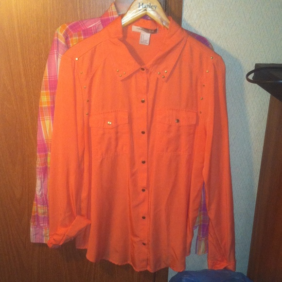 A peachish button up shirt