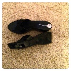 Black patent BCBG Girls wedge mules