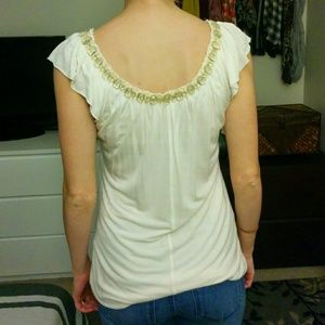 Summer top with jewel detailing around neckline