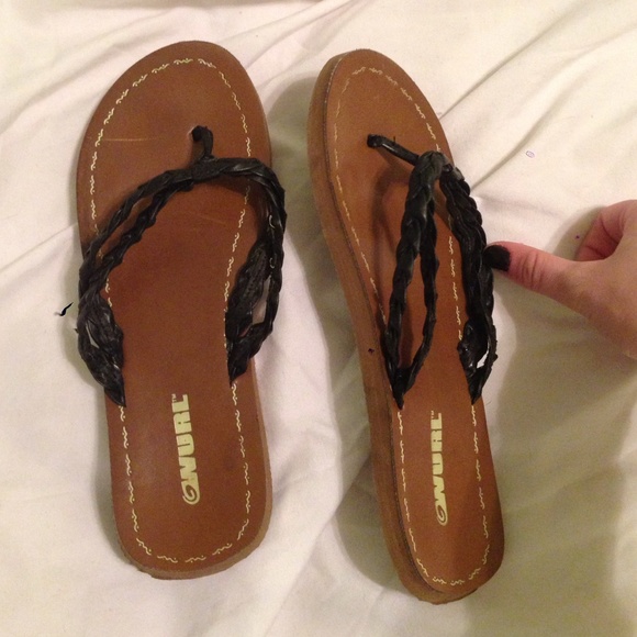 Brown and black flip-flops