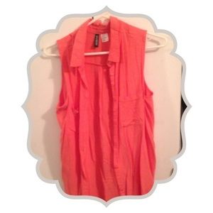 collared coral colored shirt