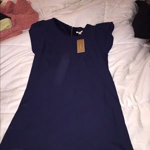 Never worn blue dress with tags on it