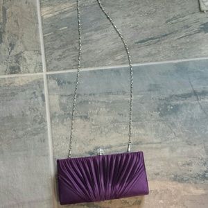 Purple satin clutch