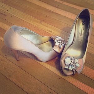 Champagne jeweled platform pumps