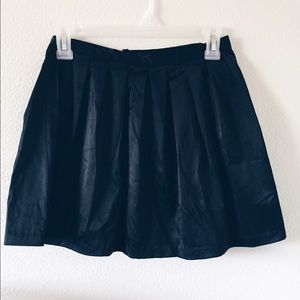 Black pleated skater skirt