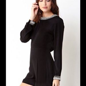 Forever 21 black beaded romper. NWT