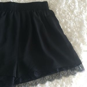 black shorts w/ lace trim and pockets