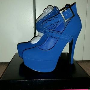 Crisscross Laser Cut-Out Platform Pumps