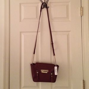 Charming Charlie Wine colored crossbody bag