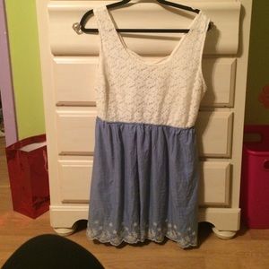 Lace dress with a blue bottom and white polka dots